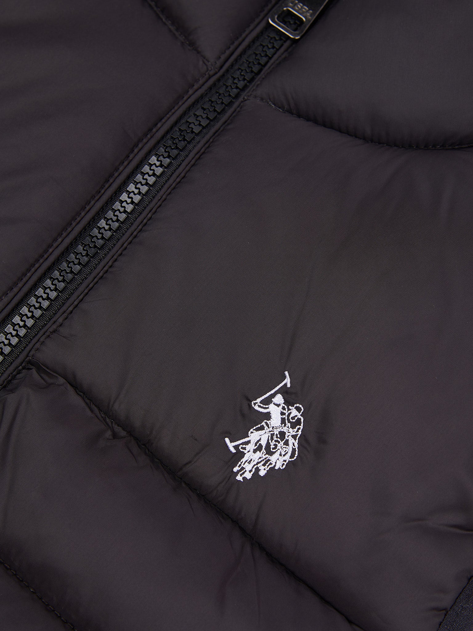 Boys Panelled Quilted Gilet in Black Bright White DHM - Image 8