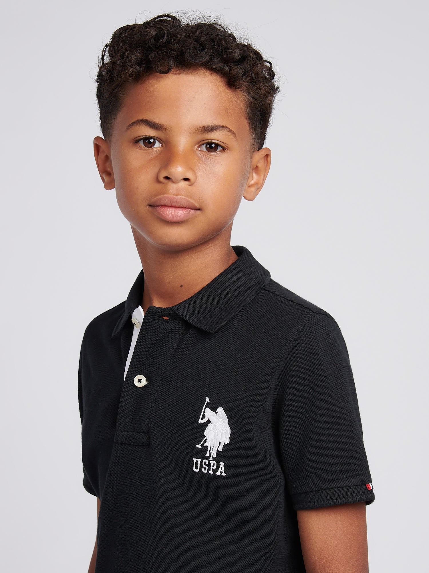 Boys Player 3 Polo Shirt Black Bright White DHM - Image 2