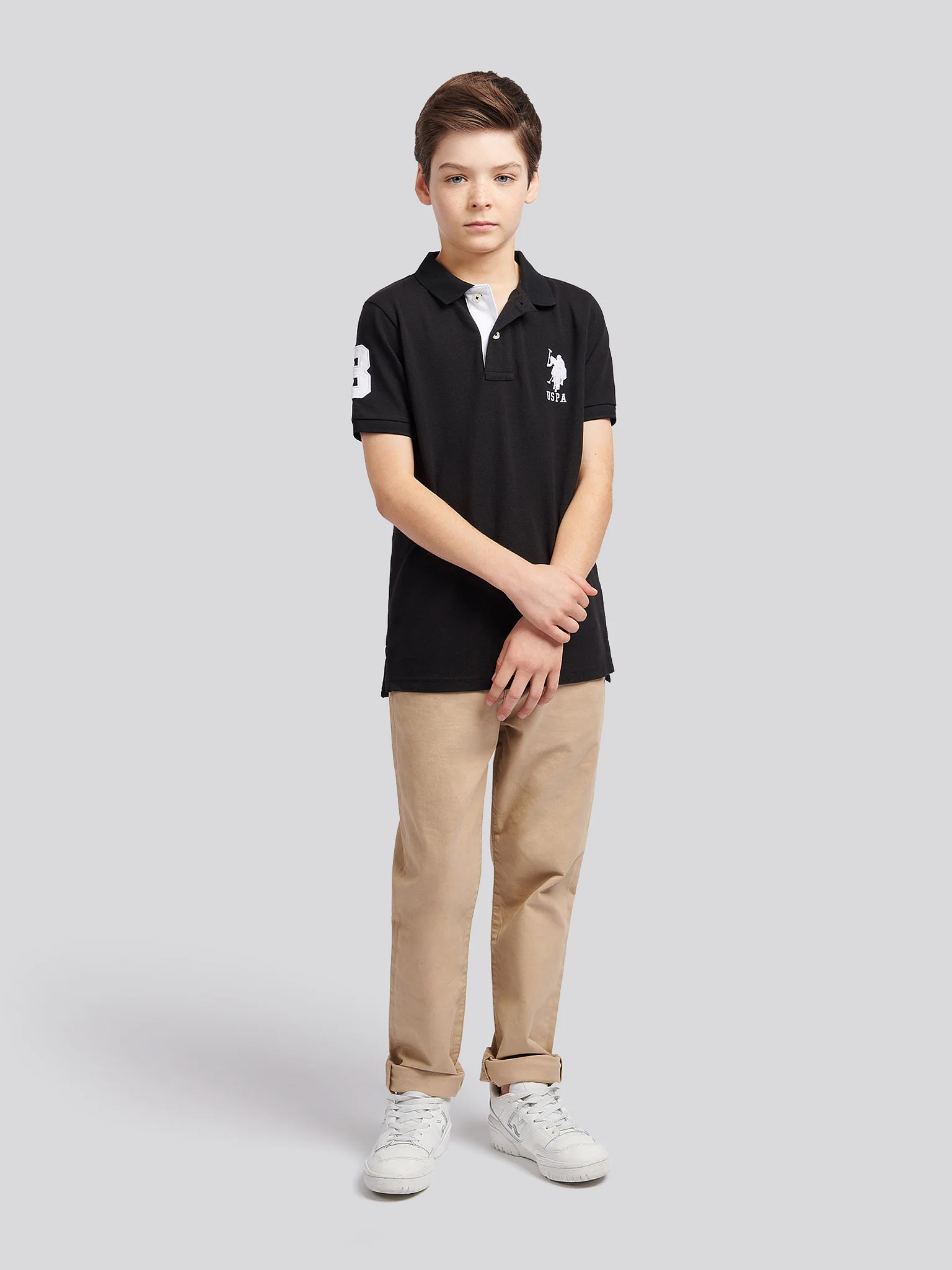 Boys Player 3 Polo Shirt in Black Bright White DHM - Image 3