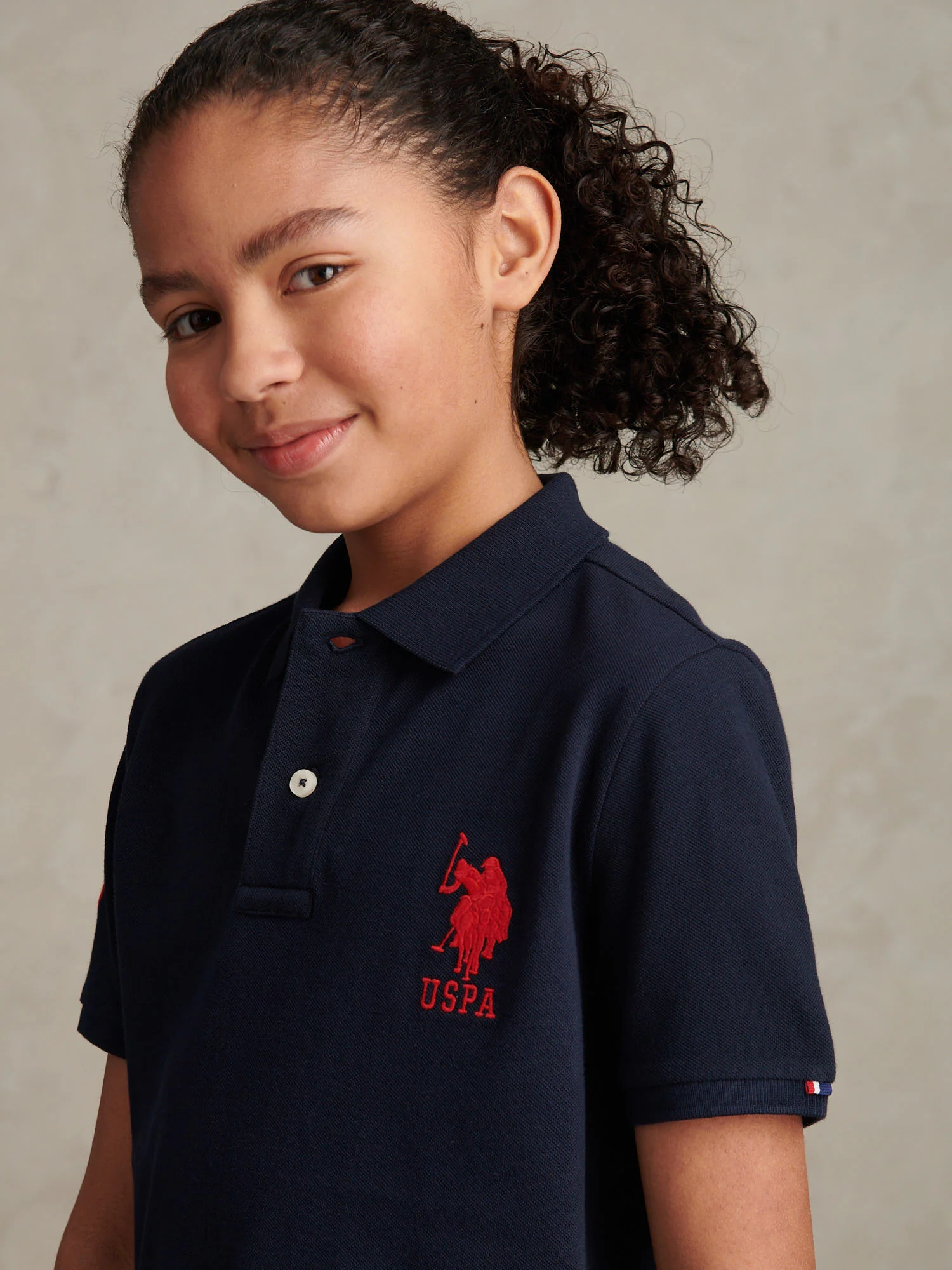 Boys Player 3 Polo Shirt Dark Sapphire Navy / Haute Red DHM - Image 2