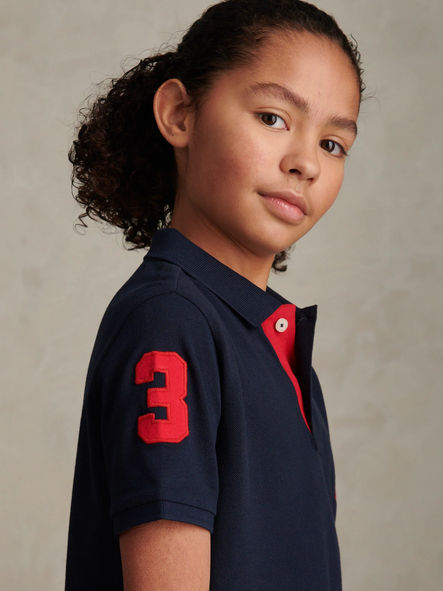 Boys Player 3 Polo Shirt Dark Sapphire Navy / Haute Red DHM - Image 5