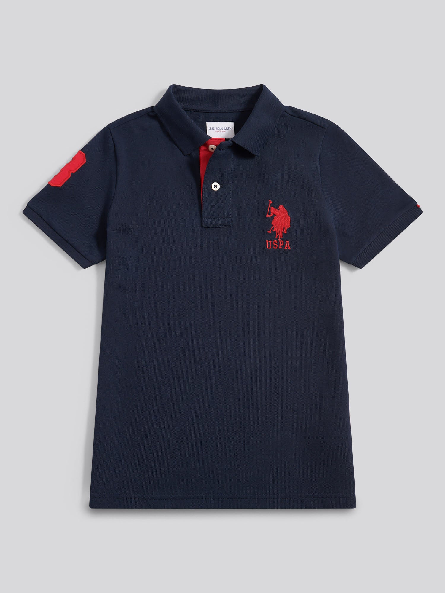 Boys Player 3 Polo Shirt Dark Sapphire Navy / Haute Red DHM - Image 6