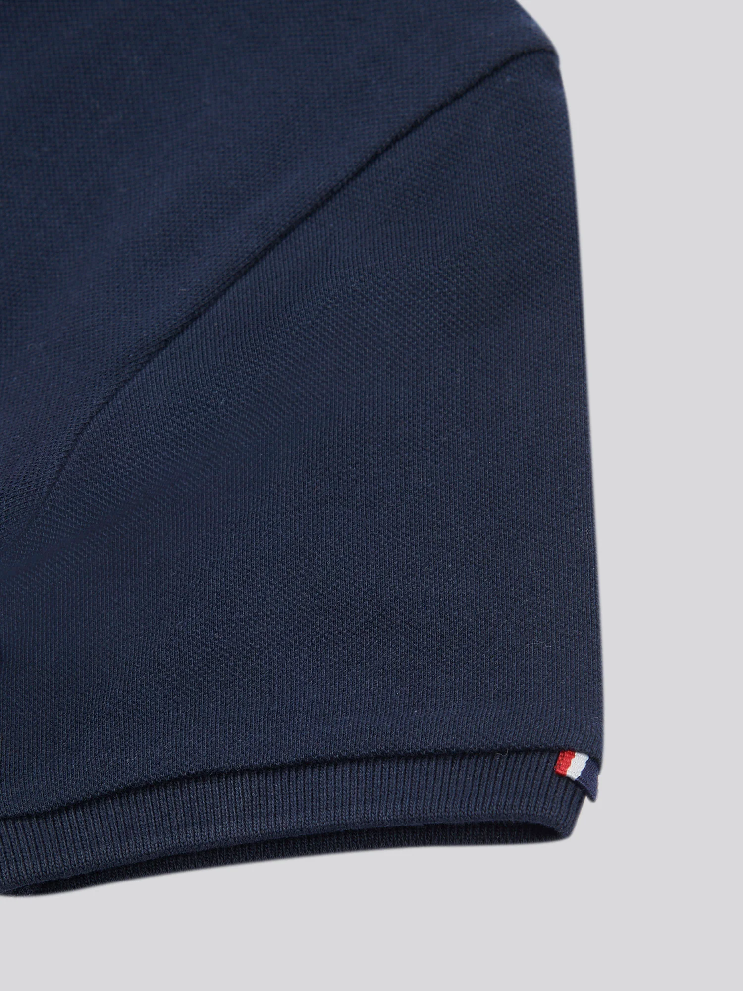 Boys Player 3 Polo Shirt in Dark Sapphire Navy / Haute Red DHM - Image 8