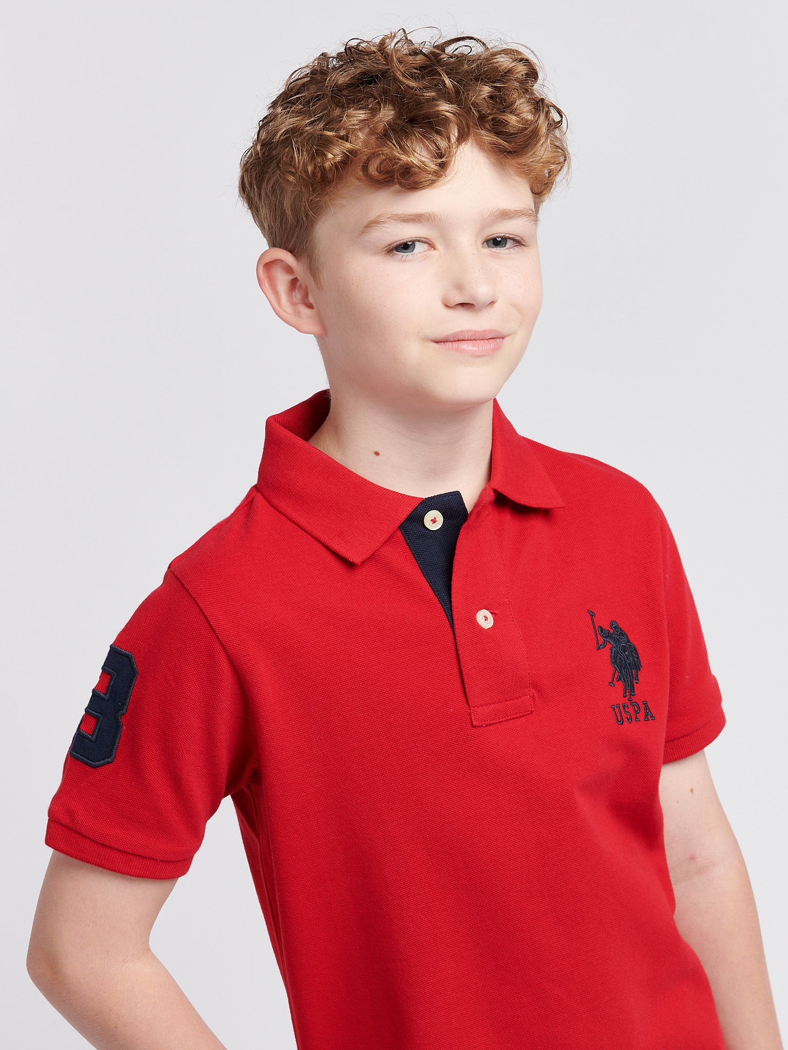 Boys Player 3 Polo Shirt in Haute Red - Image 2