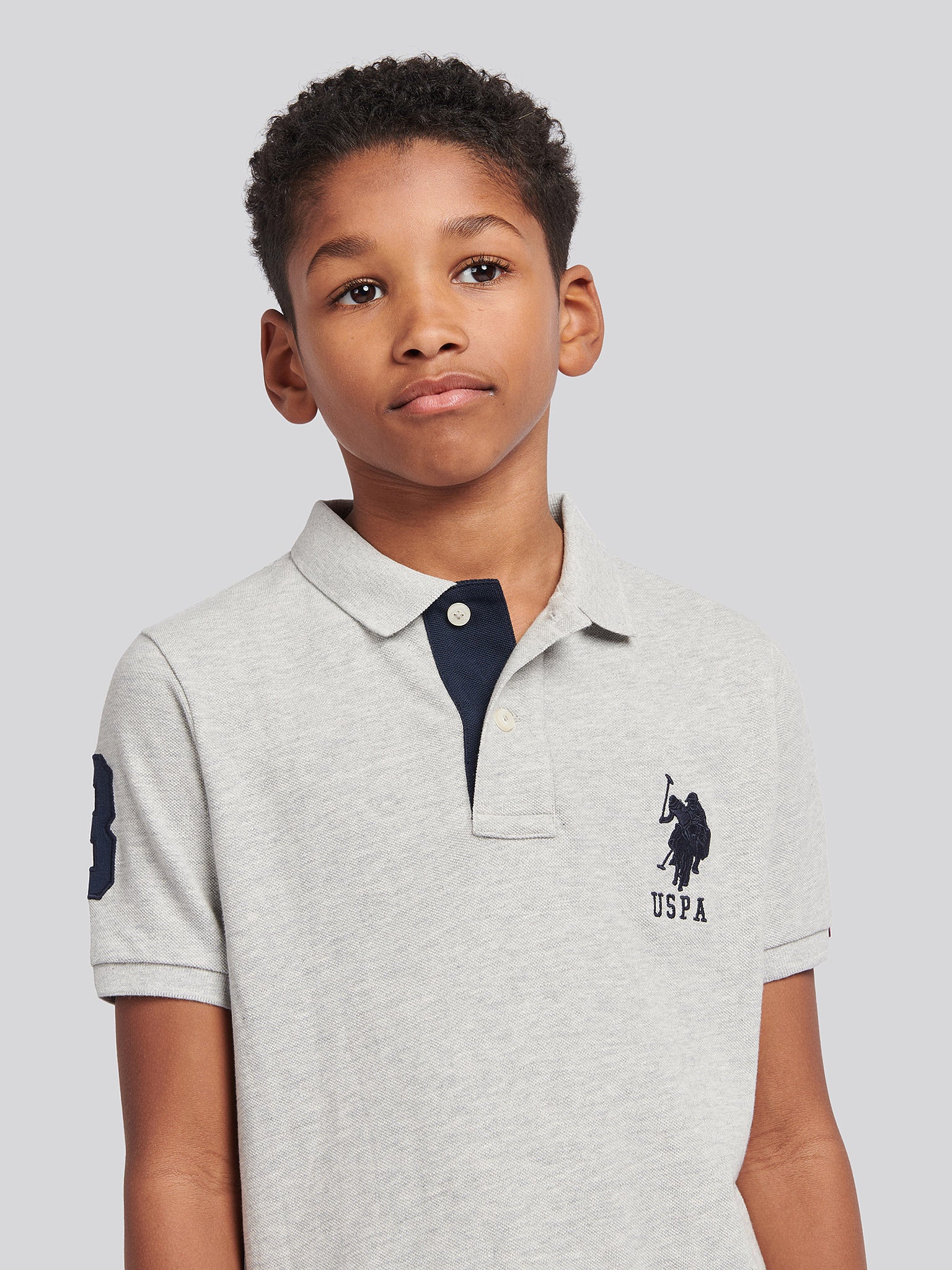 Boys Player 3 Polo Shirt in Mid Grey Marl - Image 2