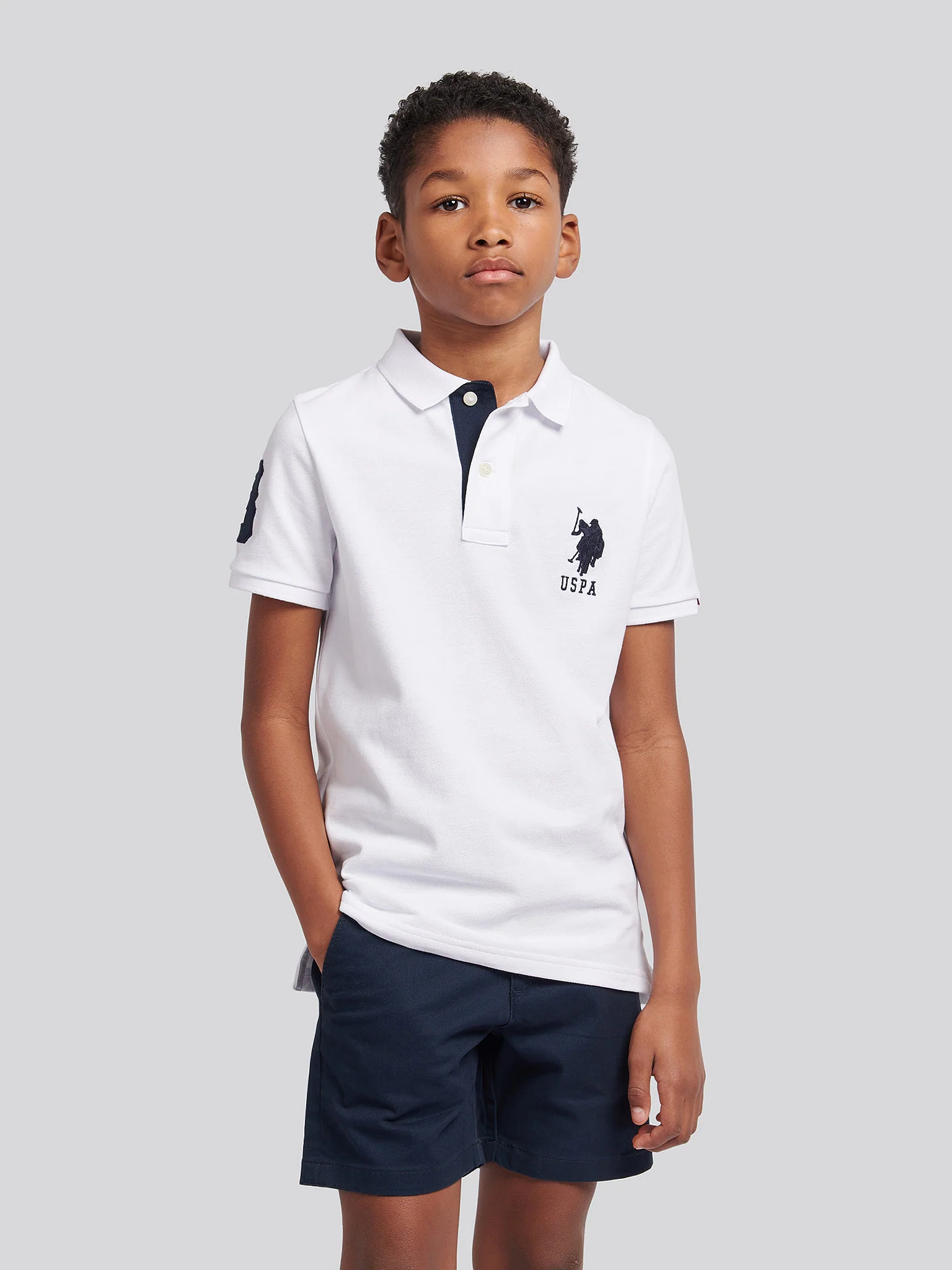 Boys Player 3 Polo Shirt in White / Dark Sapphire Navy DHM