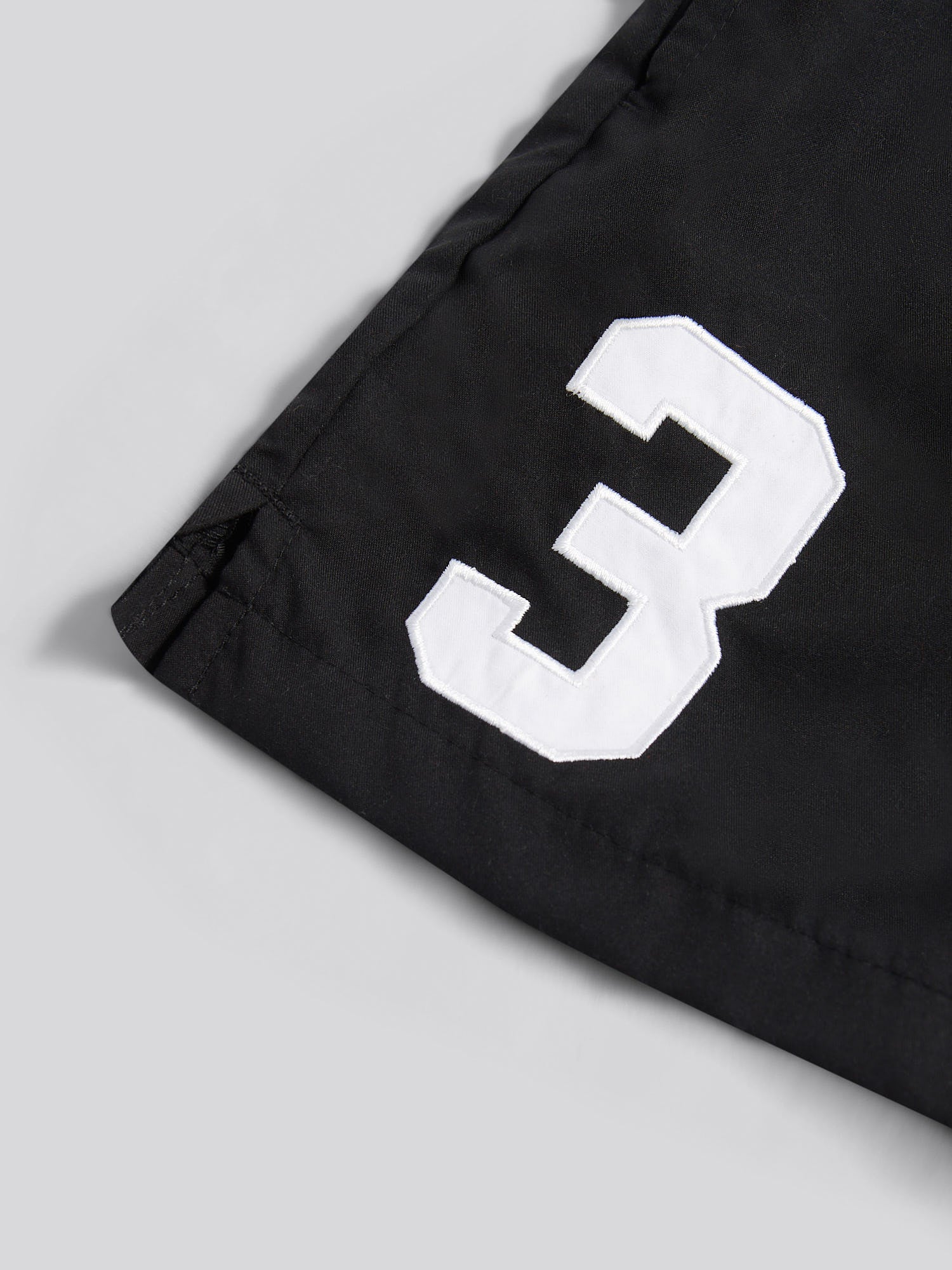 Boys Player 3 Swim Short in Black Bright White DHM - Image 7