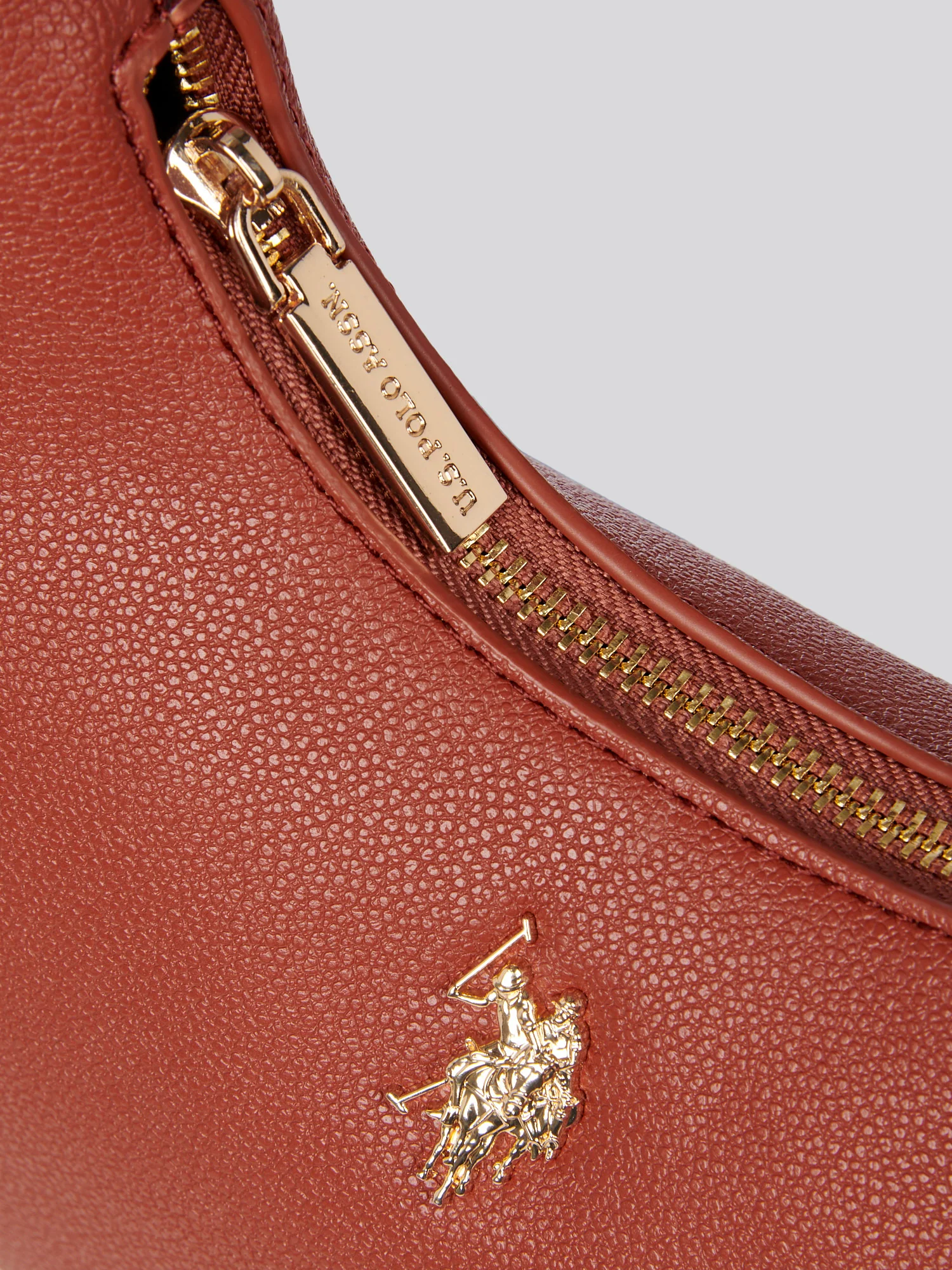 U.S. Polo Assn. Womens Jones Small Round Hobo Bag in Rust - Image 5